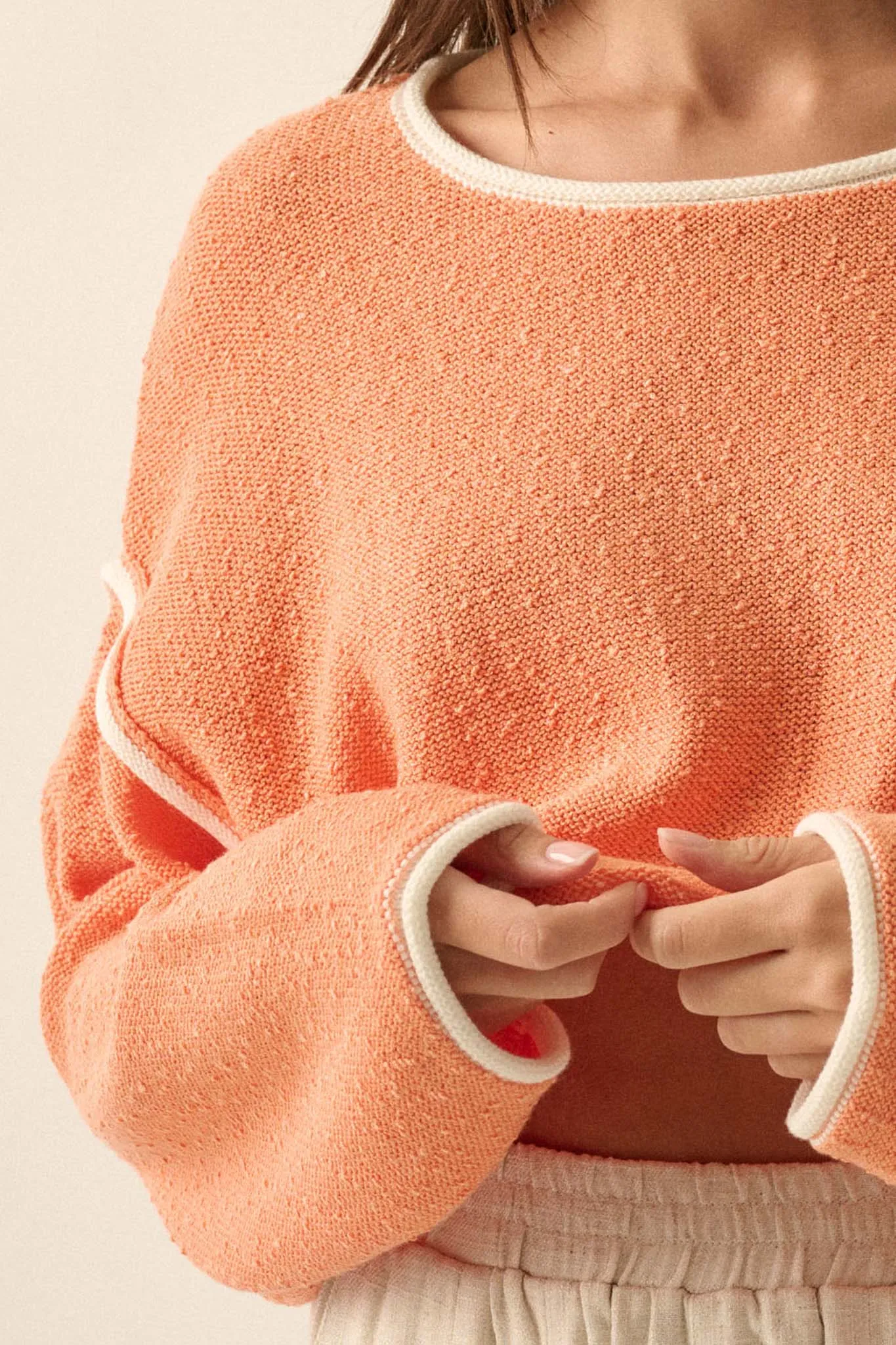 Cuddle Party Cropped Exposed-Seam Sweater