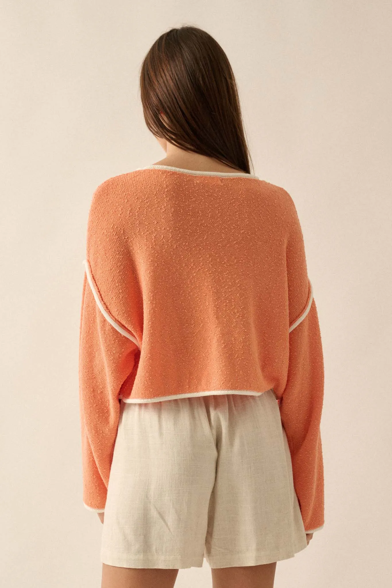 Cuddle Party Cropped Exposed-Seam Sweater